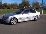 Silver BMW 325i 2003 saloon car